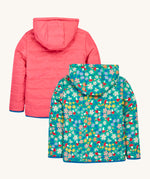 The back of the Frugi kids toasty trail reversible jacket in wild woods and tulip colour way showing the hood detail and blue trim on the arm cuff and hem