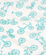 A close up of the blue bicycle print on one of the vests from the Frugi varlie vest 2 pack multipack. 