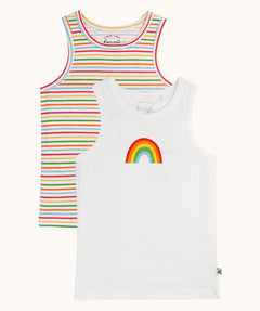 A pack of 2 Frugi varlie sleeveless, organic cotton children's vests. One vest a rainbow stripe design one is white with a rainbow in the middle of the chest area. 
