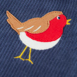 Close up of the robin applique on the Frugi veryan organic cotton navy cord dungarees.