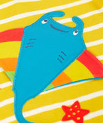 A super close up of the interactive ray applique on the front of the Frugi interactive ray applique yellow breton stripe organic cotton short sleeved T-Shirt.