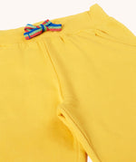 Frugi Bumblebee yellow Organic Cotton Samson Summer Shorts with rainbow stripe waist tie.