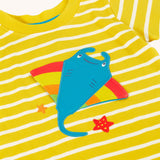 A close up of the interactive ray applique on the front of the Frugi interactive ray applique yellow breton stripe organic cotton short sleeved T-Shirt.