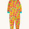 Frugi zelah zip up all in one with a floral fields print design. A bright yellow organic cotton all in one with pink and orange flowers all over with turquoise coloured arm and leg cuffs and collar trim.
