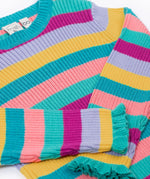 The Frugi Zoe knitted jumper wild rainbow stripe top. This child's top is made with organic cotton. The photo shows a zoomed in photo focusing on the sleeves which have turquoise frilled detail on them. 