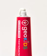 Georganics fluoride free strawberry hydroxyapatite toothpaste showing contents coming out of the nozzle