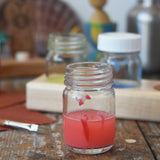 50ml Glass paint jar pot with red paint inside.