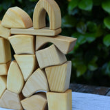 Glückskäfer 17 small natural blocks stacked up. 