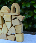 Glückskäfer 17 small natural blocks stacked up. 
