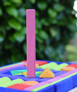 Glückskäfer 53 piece big provence wooden blocks set in a storage display tray with the largest and smallest block taken out and placed next to each other.