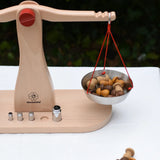 Glückskäfer balance with weights children's weighing scales toy with one side filled with Grapat mushrooms.  