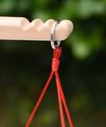 Close up of the ring hanger on the scales on the Glückskäfer balance with weights children's weighing scales toy.  