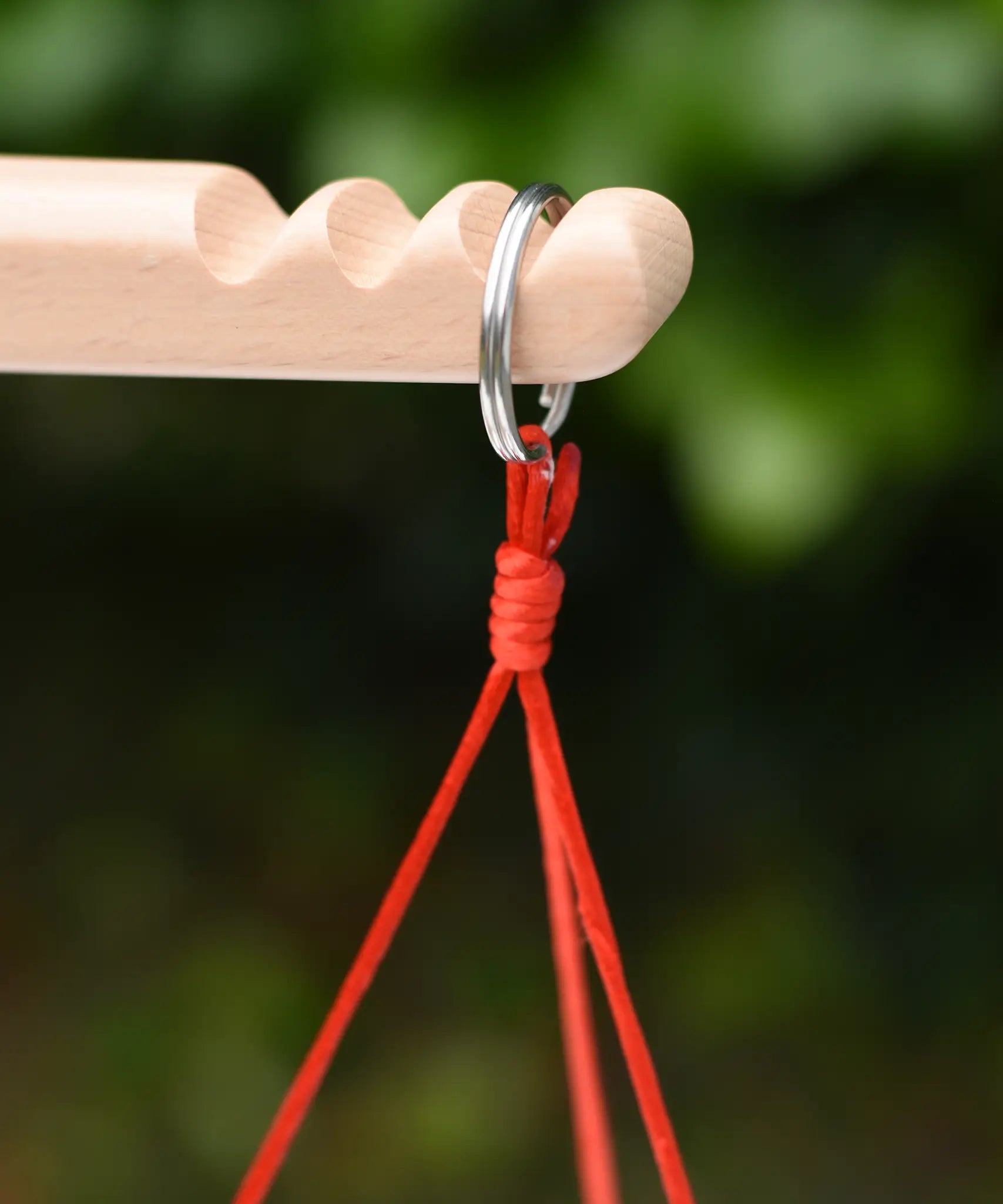 Close up of the ring hanger on the scales on the Glückskäfer balance with weights children's weighing scales toy.  