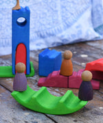 Two Grapat Nins placed on an upside down bridge piece from the Gluckskafer castle set used as a seesaw. 