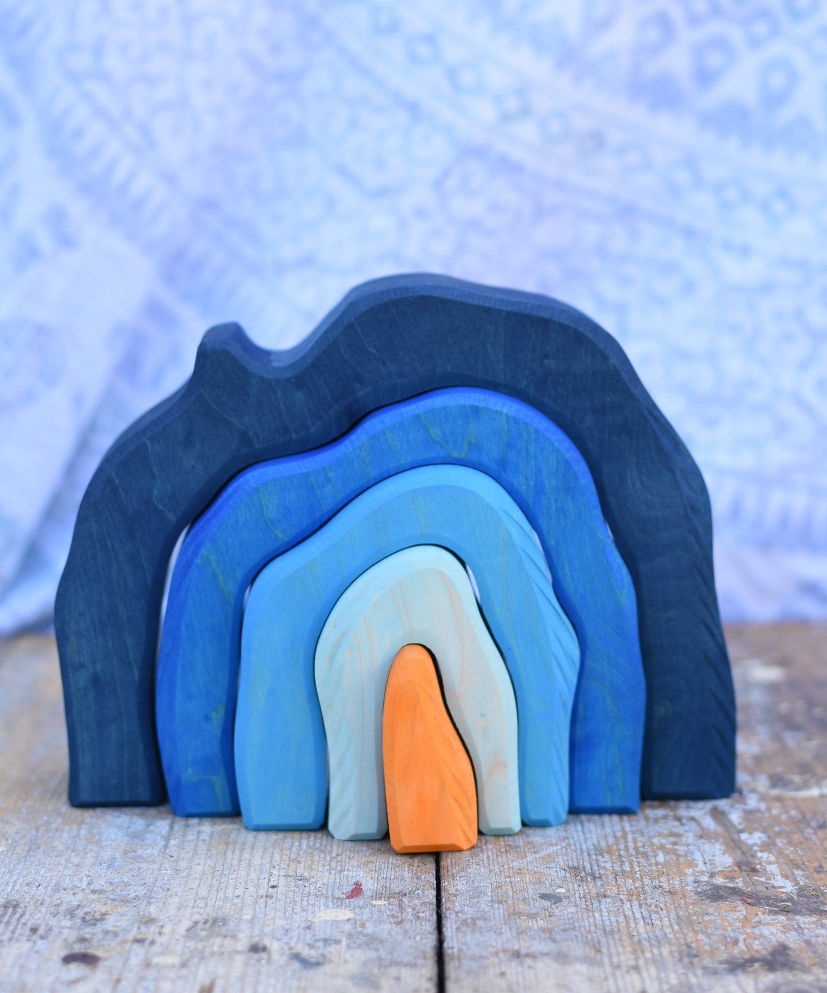 The Glückskäfer Blue Grotto placed on a wooden surface.