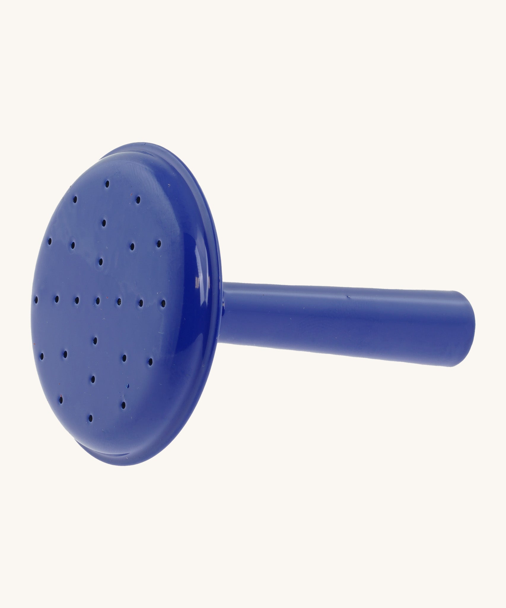 A close up of the spout attatchment for the blue Gluckskafer metal watering can showing the holes where the water flows.