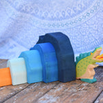 A Holztiger green dragon placed besides the Glückskäfer Blue Grotto.