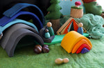 The Glückskäfer Wooden Stacking Bonfire used in a small world play scene along with Grapat Nins and other toys. 