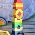 The Glückskäfer Crooked Tower placed on a wooden surface. 