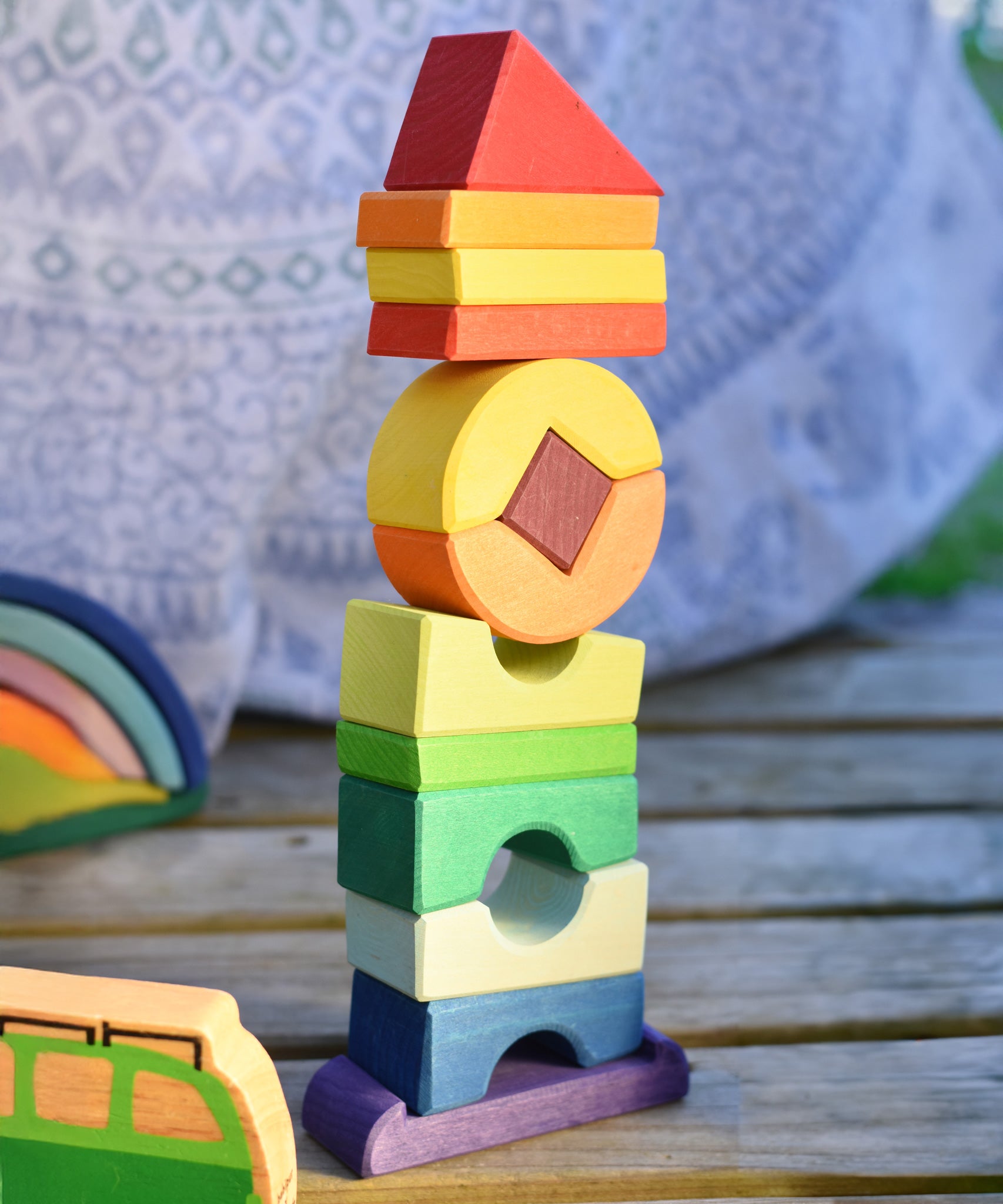 The Glückskäfer Crooked Tower placed on a wooden surface. 
