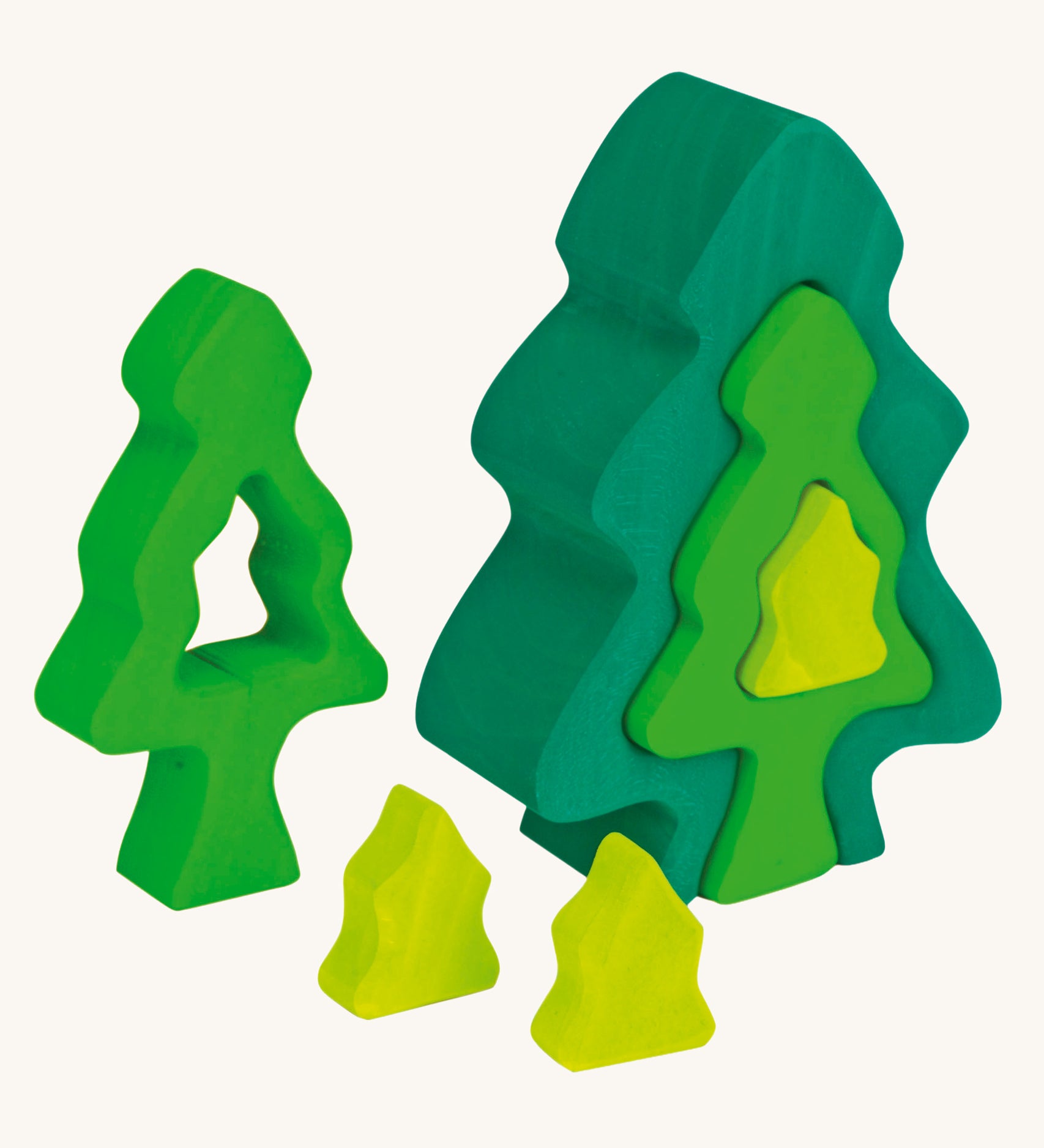 The pieces from the Glückskäfer 6-Piece Fir Tree shown separated. 