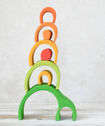 Glückskäfer Green 8 Piece Arch House with the pieces stacked up.