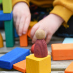 A Grapat Nin placed on a yellow cube block.