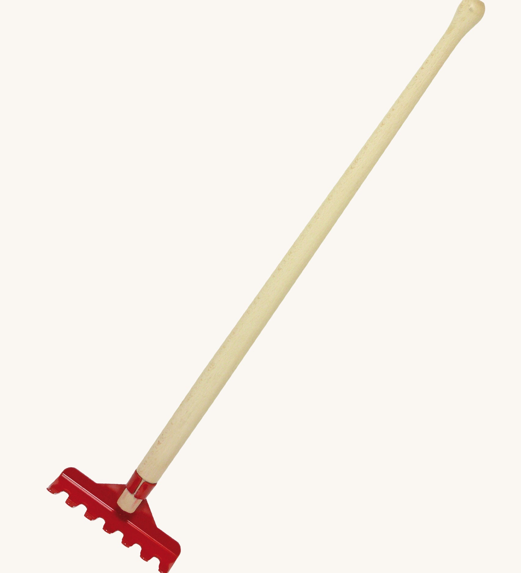 The Gluckskafer outdoor toy rake, with a long 60cm wooden handle and a red metal rake