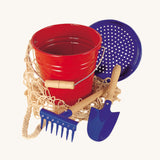 The Gluckskafer outdoor garden toy set, including a metal bucket, sand sieve, round shovel, rake, and cotton net