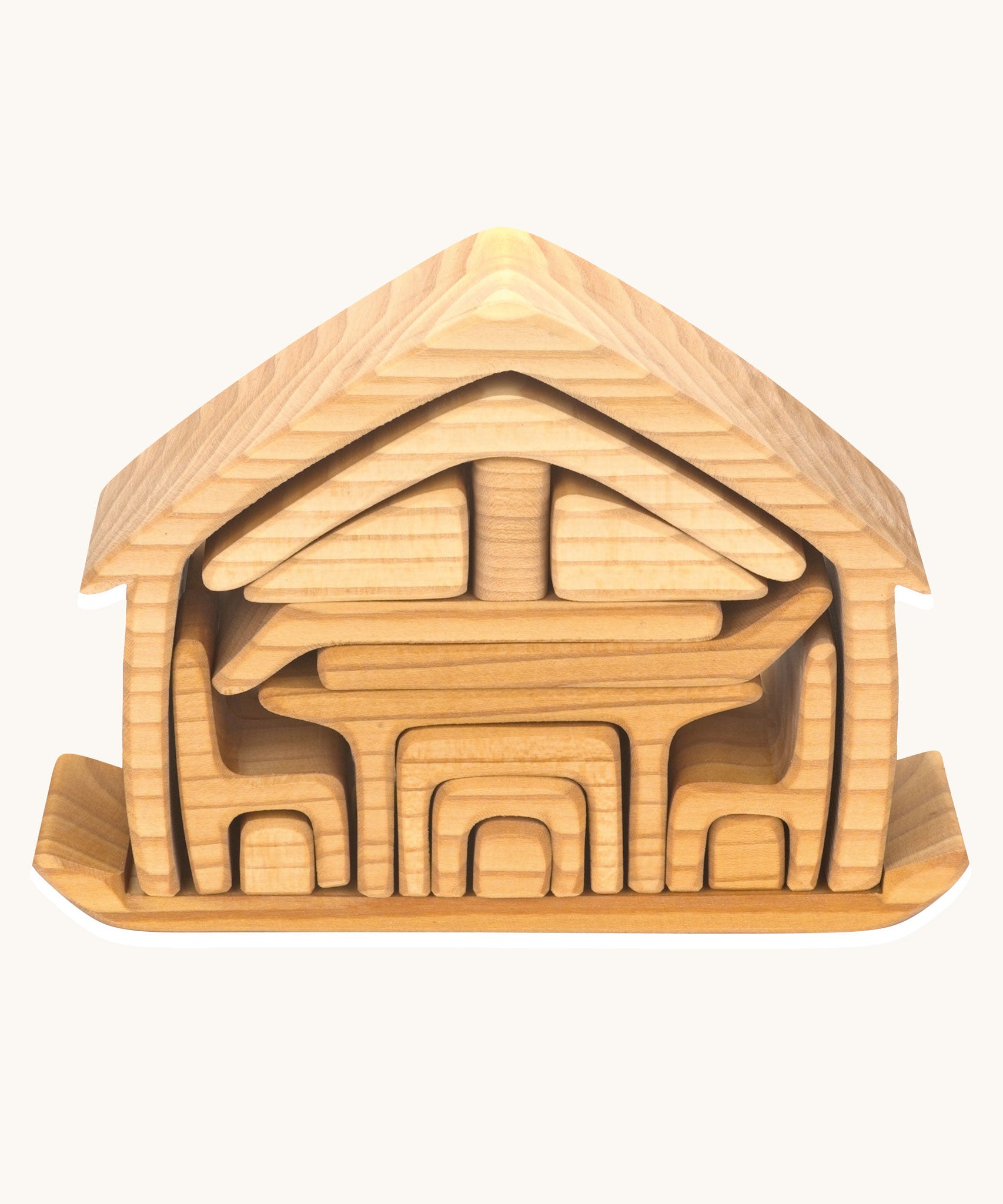 The Gluckskafer Natural All-In House wooden toy shown with all the pieces neatly stacked on it's base piece.