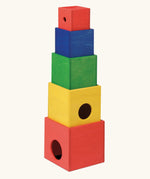 Nic Toys stack n cubes rainbow coloured stacking boxes with circular holes. 
