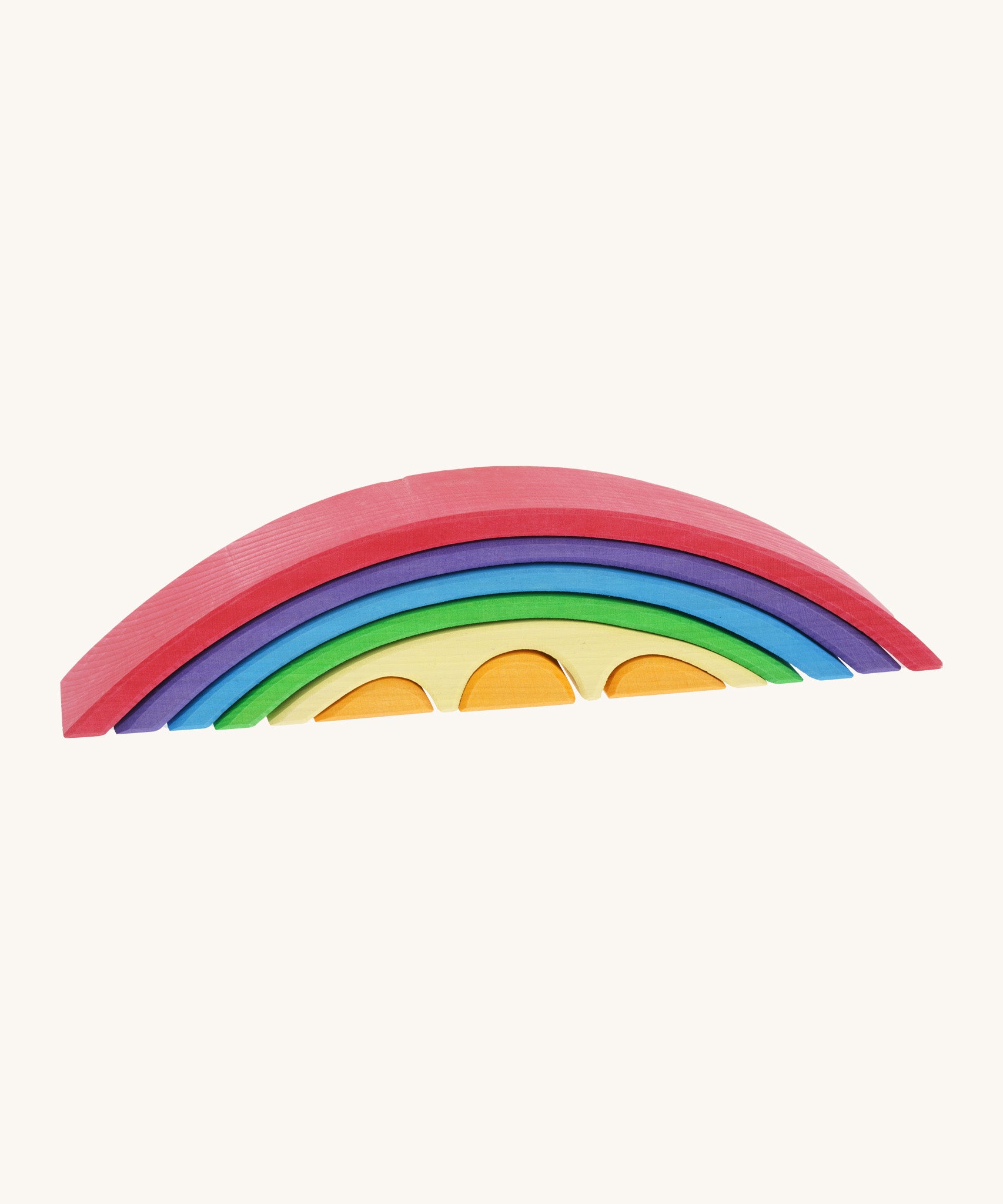 Gluckskafer wooden rainbow stacker toy. Features 4 arched handcut and hand painted pieces in red purple blue green and yellow. Also features 3 orange pieces that slot into the smallest yellow arch piece 