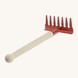 Gluckskafer red  metal rake for kids, features a smooth wooden handle for grip