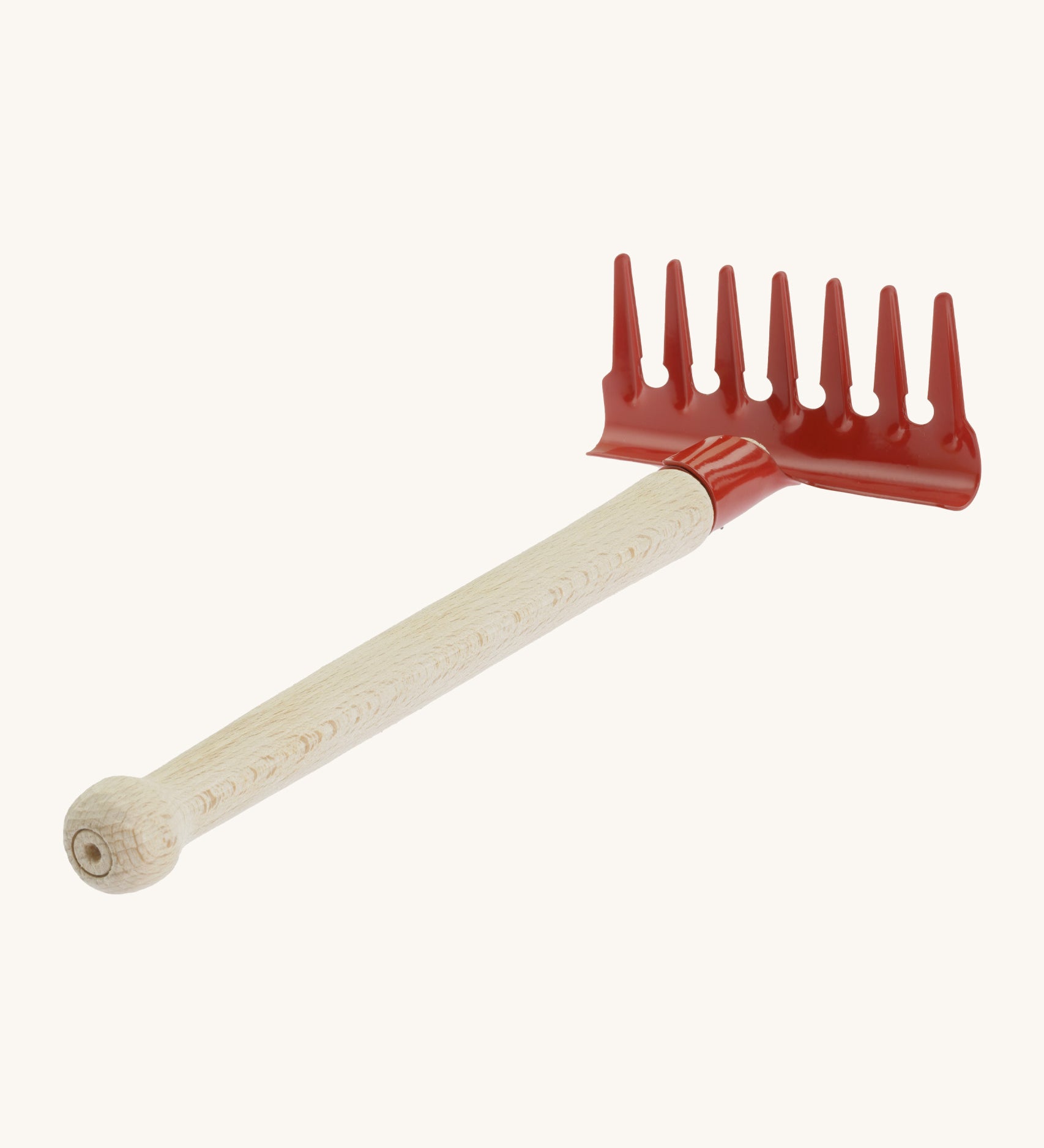 Gluckskafer red  metal rake for kids, features a smooth wooden handle for grip