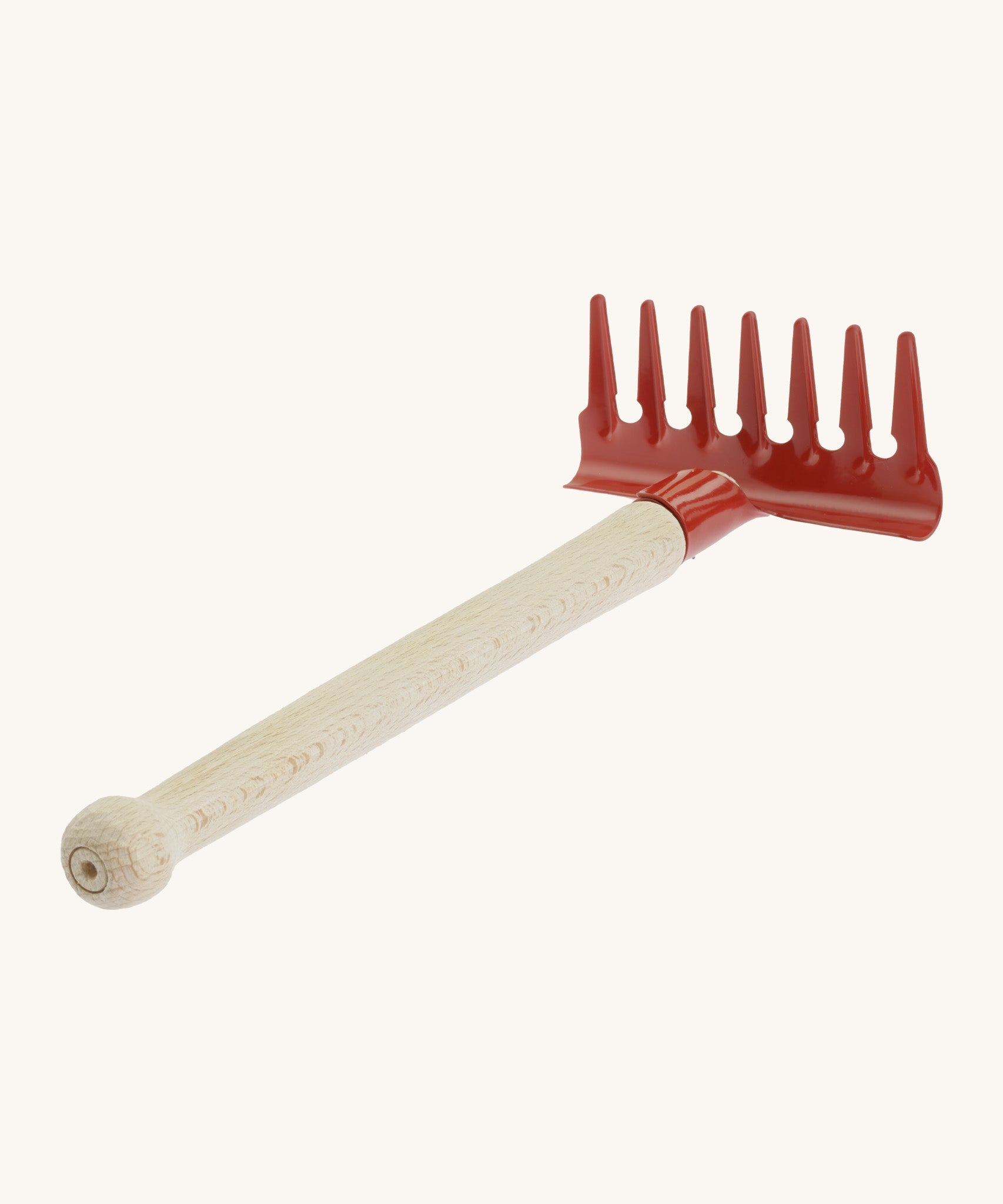 Gluckskafer red  metal rake for kids, features a smooth wooden handle for grip
