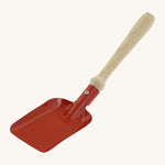 Gluckskafer red metal shovel in a square shape. Features a wooden handle for grip. 