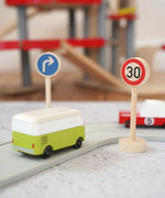 Gluckskafer miniature right turn traffic wooden sign next to a 30 speed limit sign and a playroad