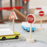 Gluckskafer miniature wooden traffic light, stop and no entry sign next to a playroad with Candylab cars