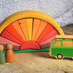 The Glückskäfer Yellow Sunray Arch in a simple small world play scene with the Lanka Kade camper van and Grapat Nins. 