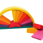Gluckskafer Yellow Sunray Arch with three pieces out of the arch laid out in front pictured on a plain white background