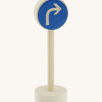 Gluckskafer small world right turn road wooden sign