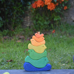 The Glückskäfer Bird Stacker placed on a slate surface outdoors. 