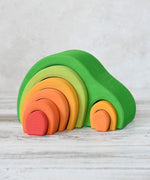 Glückskäfer Green 8 Piece Arch House shown on a wooden surface.