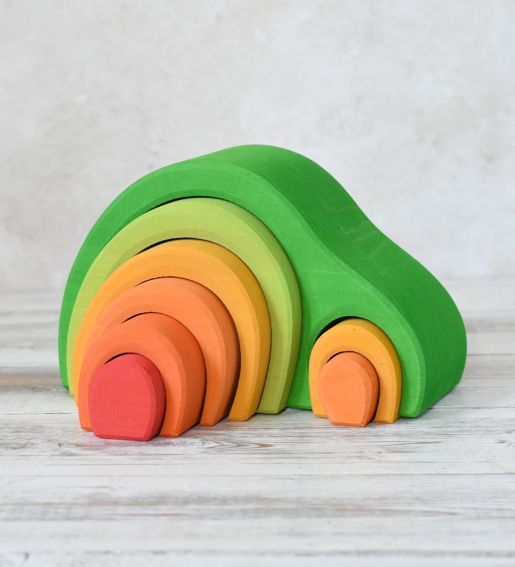 Glückskäfer Green 8 Piece Arch House shown on a wooden surface.