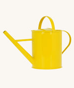 The Glückskäfer Children's 1L Metal Watering Can - Yellow shown without the rose.