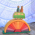 The Glückskäfer Yellow Sunray Arch in a simple small world play scene with the Lanka Kade camper van and Grapat Nins.