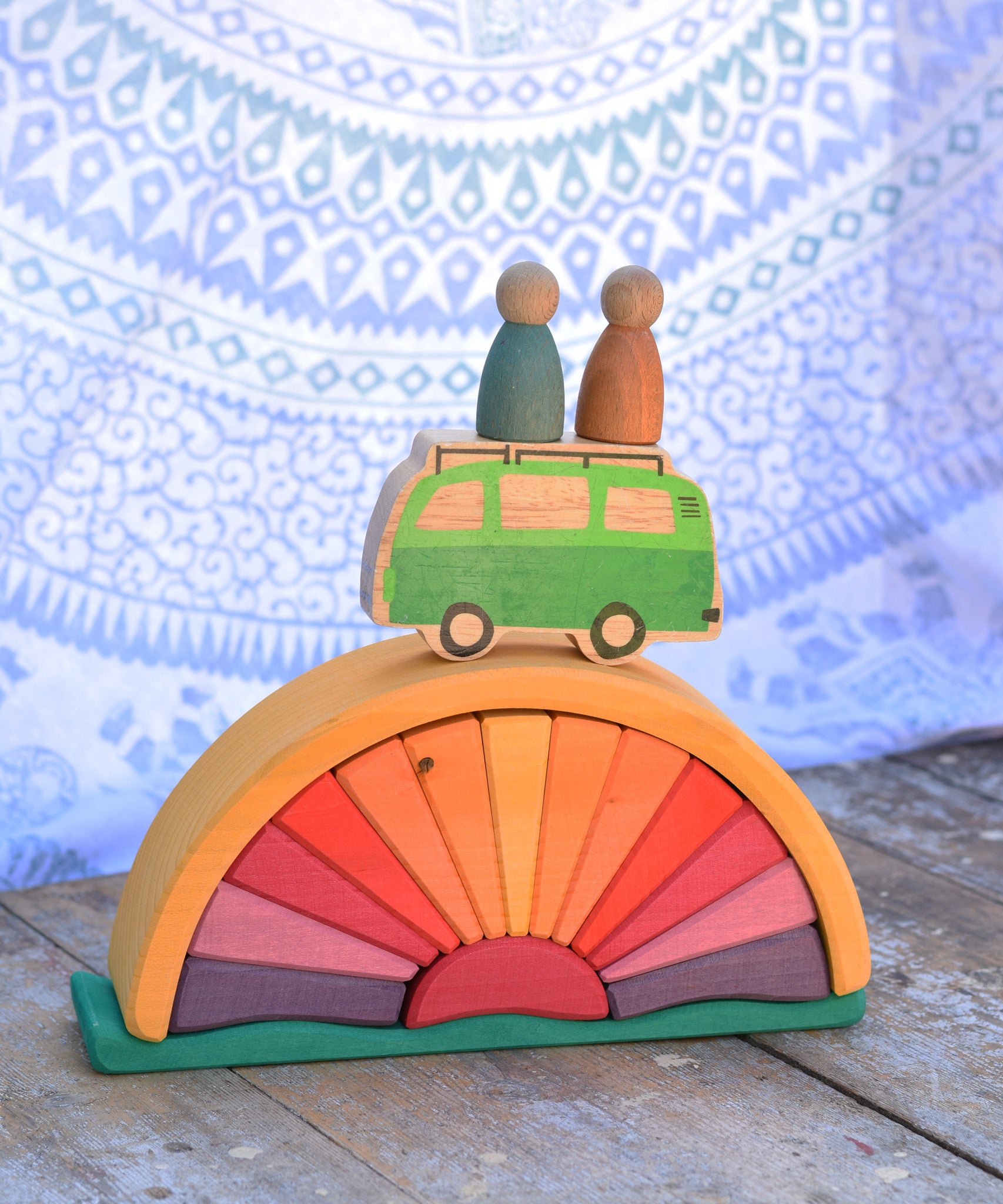 The Glückskäfer Yellow Sunray Arch in a simple small world play scene with the Lanka Kade camper van and Grapat Nins.