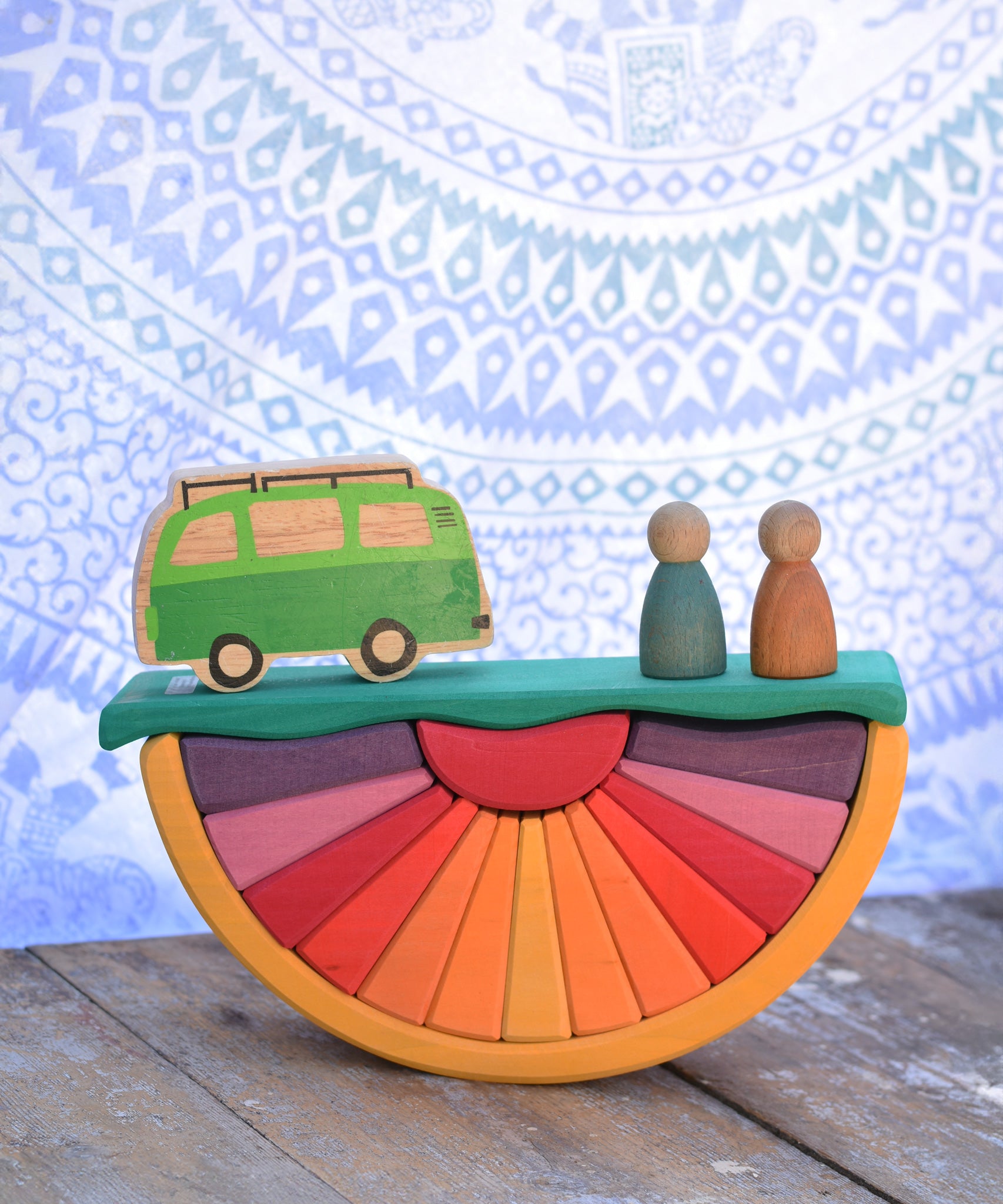 The Glückskäfer Yellow Sunray Arch in a simple small world play scene with the Lanka Kade camper van and Grapat Nins.