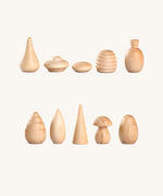 Grapat 120 Natural Wooden Mandala Pieces in a cotton bag. A mix of 10 different shapes in a natural wood. There are 12 of each shape supplied. These wooden loose part toys are part of a wide range of open ended toys available at Babipur. 