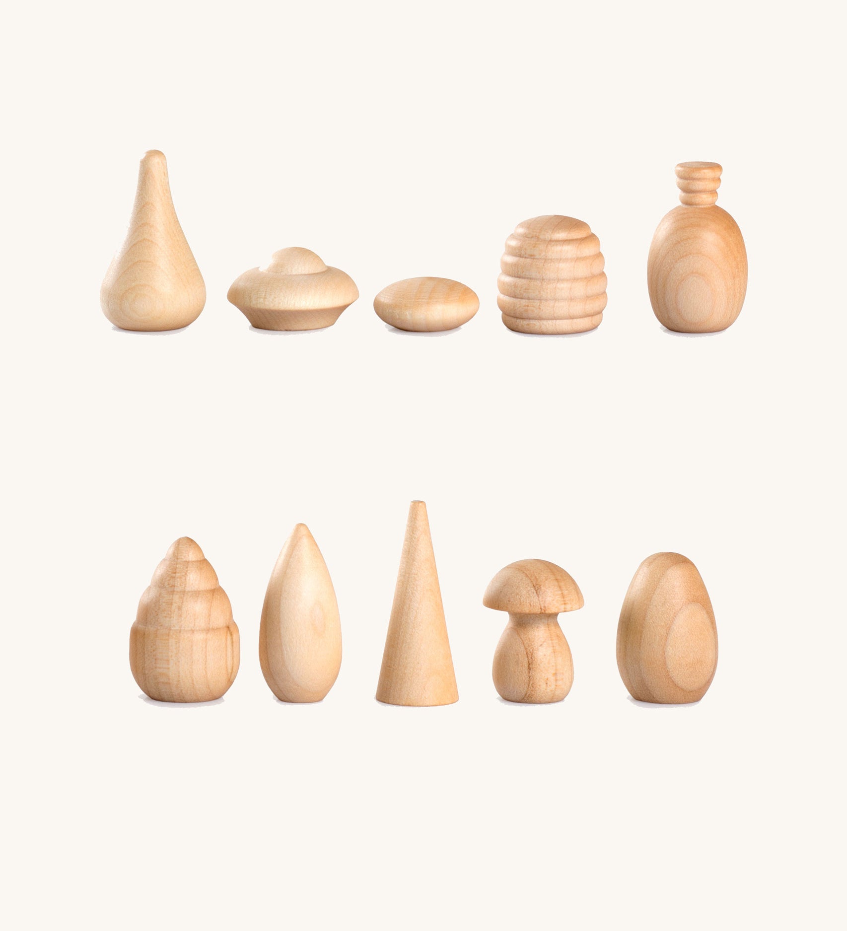 Grapat 120 Natural Wooden Mandala Pieces in a cotton bag. A mix of 10 different shapes in a natural wood. There are 12 of each shape supplied. These wooden loose part toys are part of a wide range of open ended toys available at Babipur. 